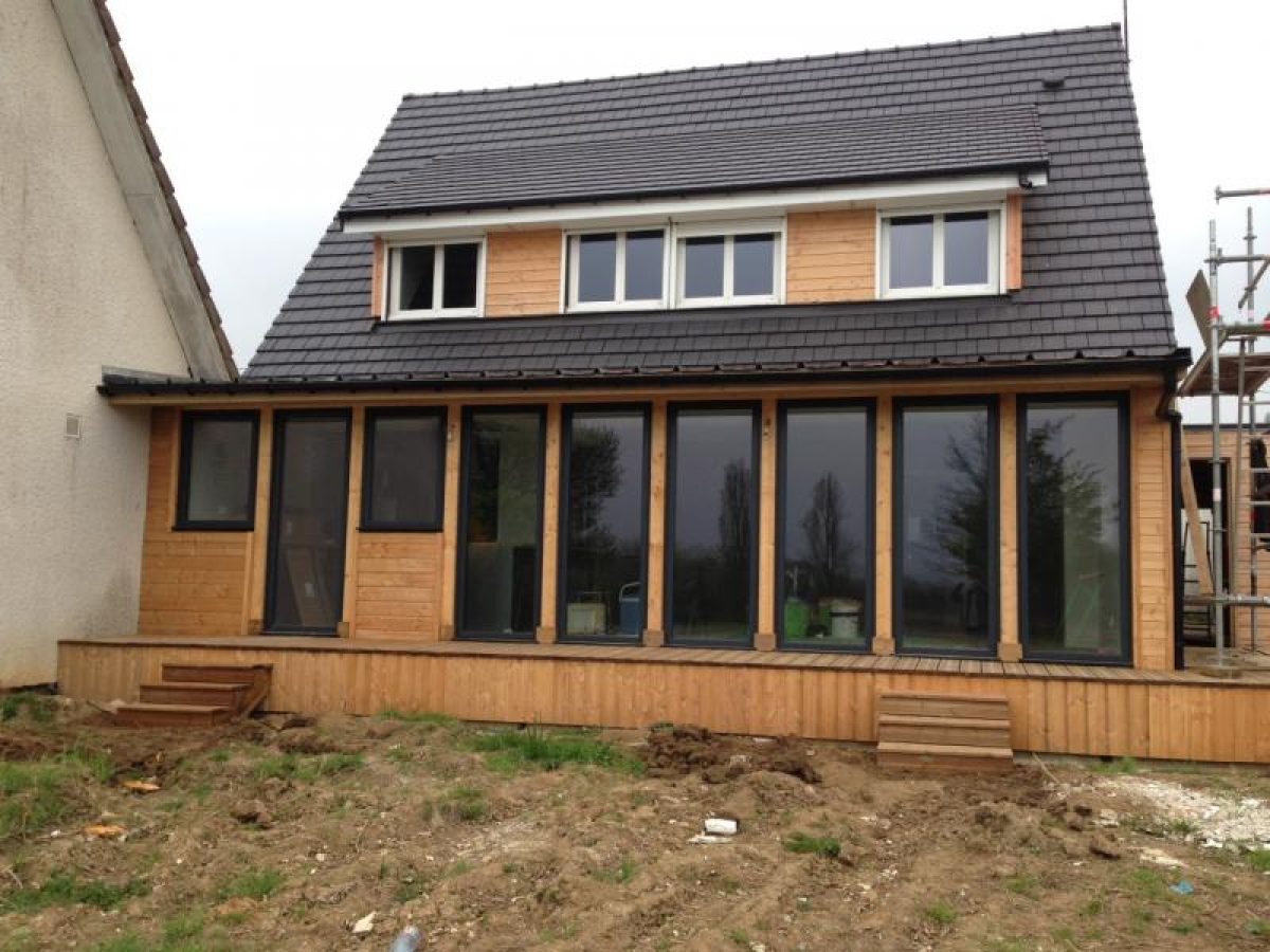 Réalisation d'une extension, ossature bois par Arts Menuiserie Agencement, menuisier à Rouen