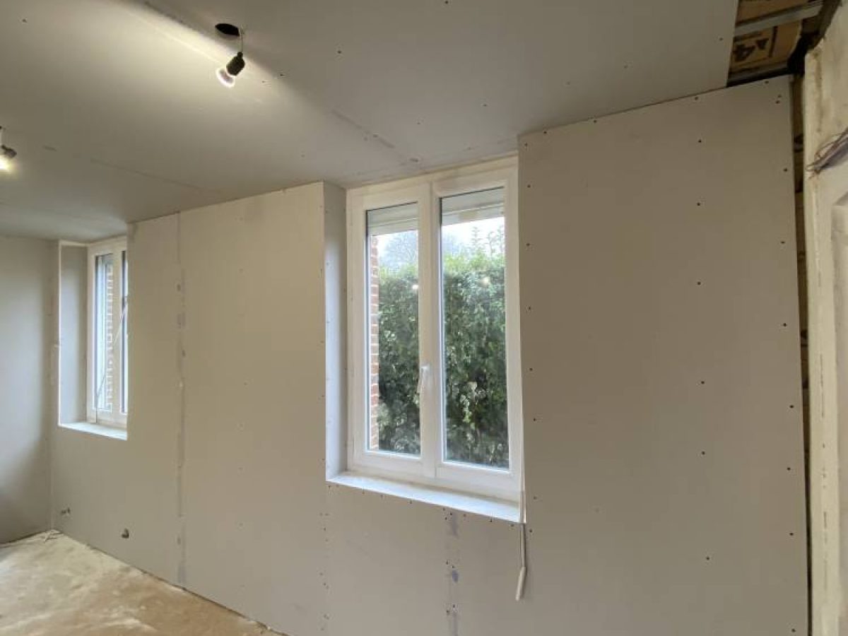 Réalisation d'une isolation par Arts Menuiserie Agencement, menuisier à Rouen