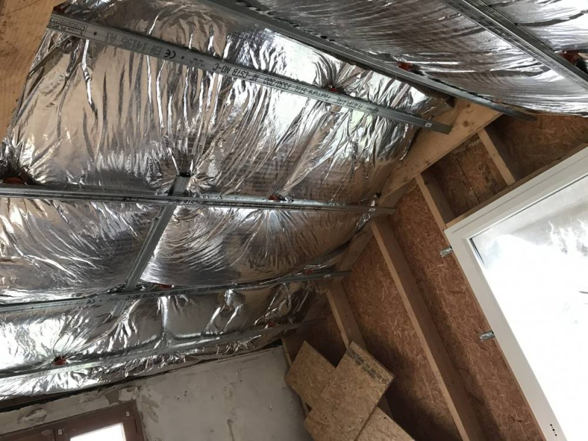 Réalisation d'une isolation par Arts Menuiserie Agencement, menuisier à Rouen