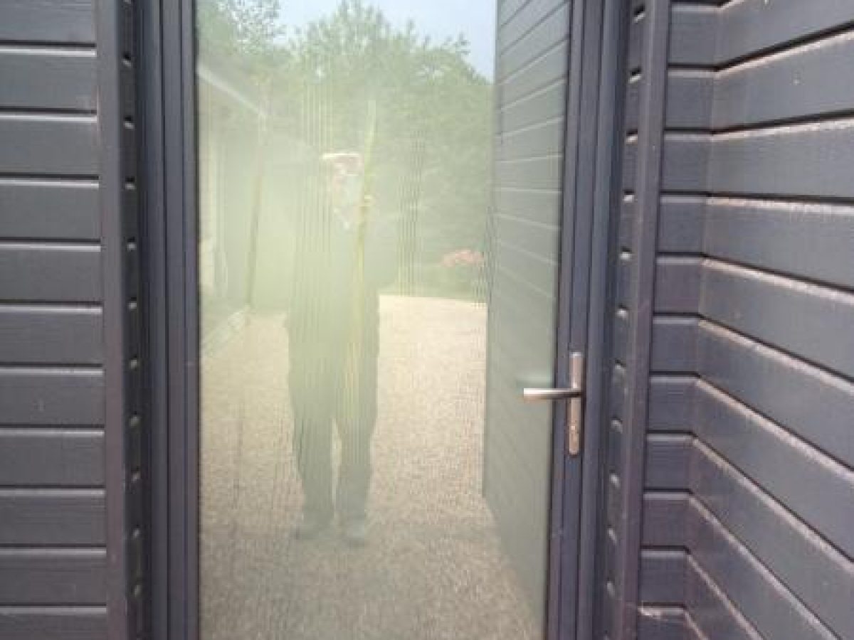 Réalisation d'une porte d'entrée par Arts Menuiserie Agencement, menuisier à Rouen