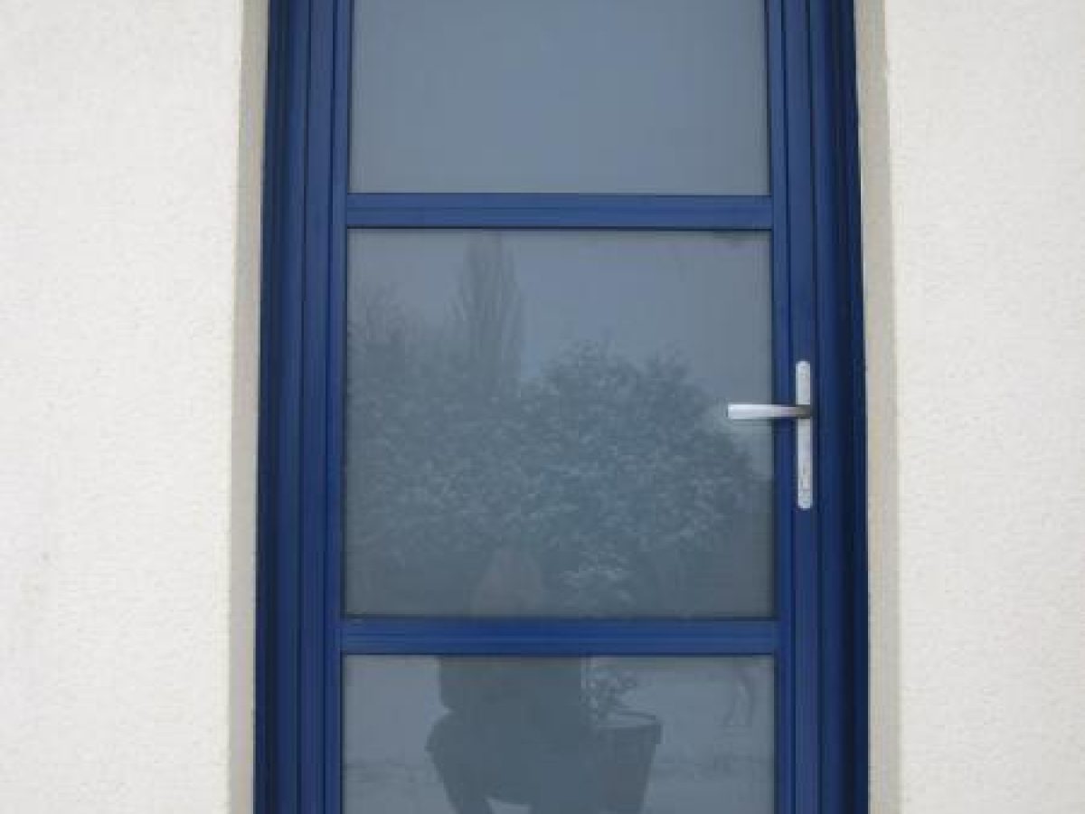 Réalisation d'une porte d'entrée par Arts Menuiserie Agencement, menuisier à Rouen